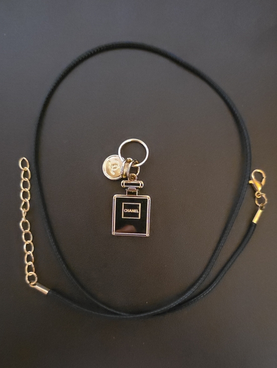 CHANEL Jewelry - Chanel Christmas Charm W/ Free Necklace on Black Wax Leather Cord Plus